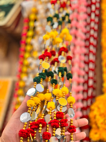 Pompom mirror lari