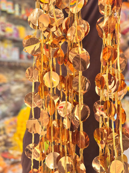 Round gold lari